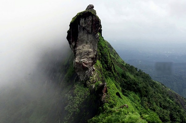 This massive hill is formed by three distinct peaks, each rising above 4,000 feet. Each peak has its own unique shape.
